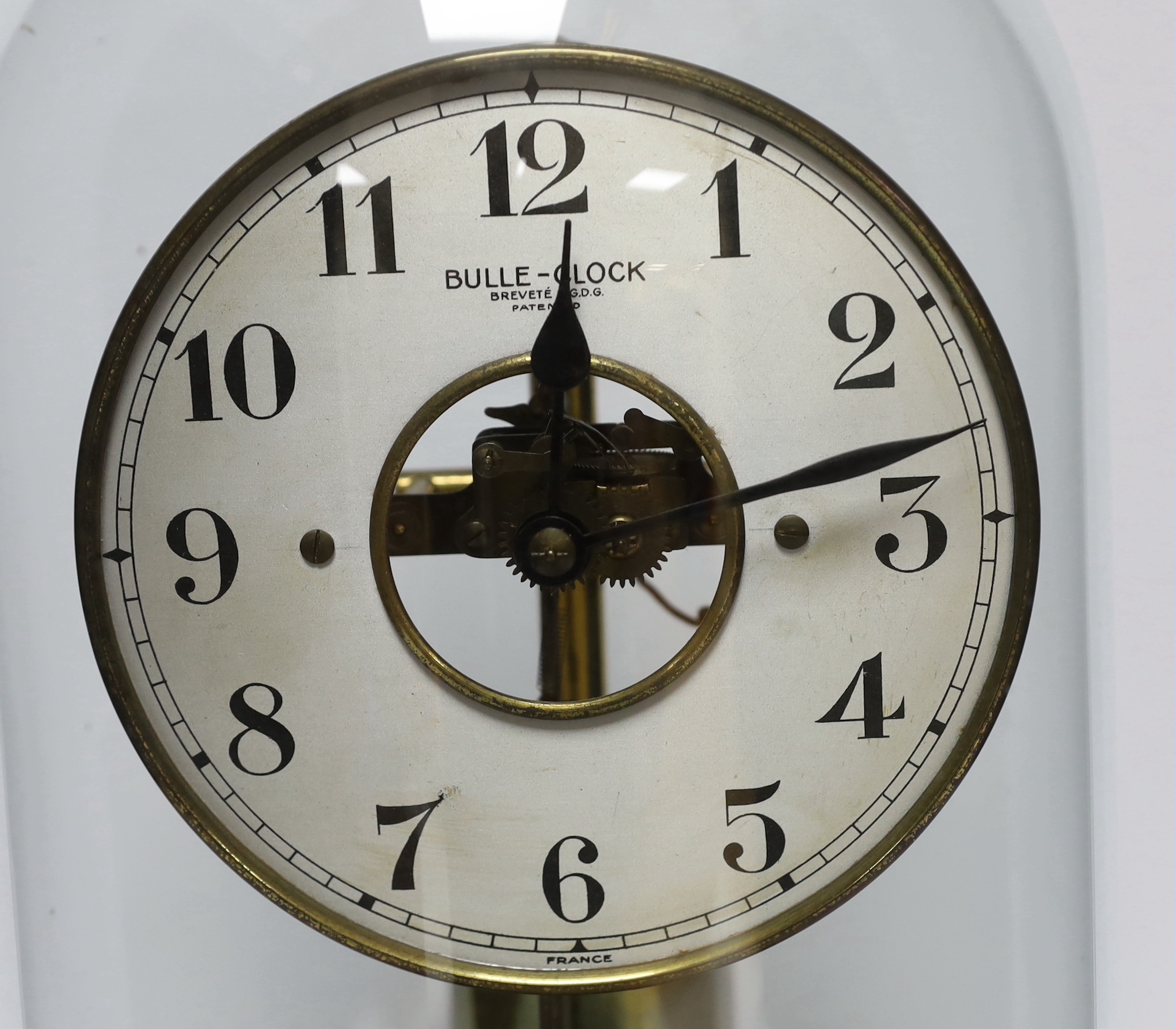 A Bulle electro-magnetic mantel clock, applied plaque to base, 40cm high